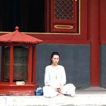Praying in a temple in Beijng